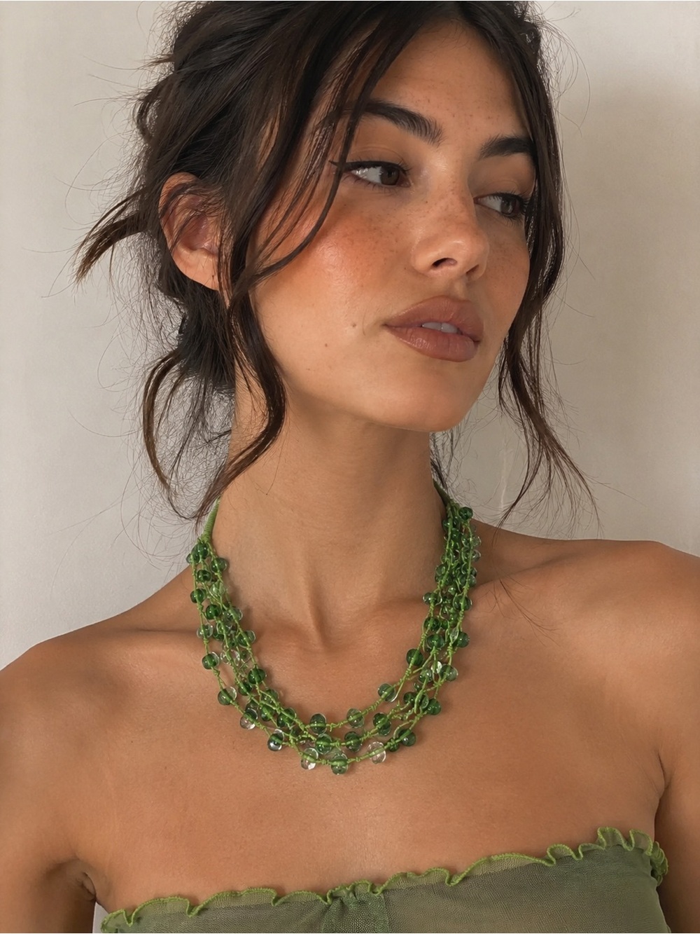 multi-strand green and clear glass bead necklace